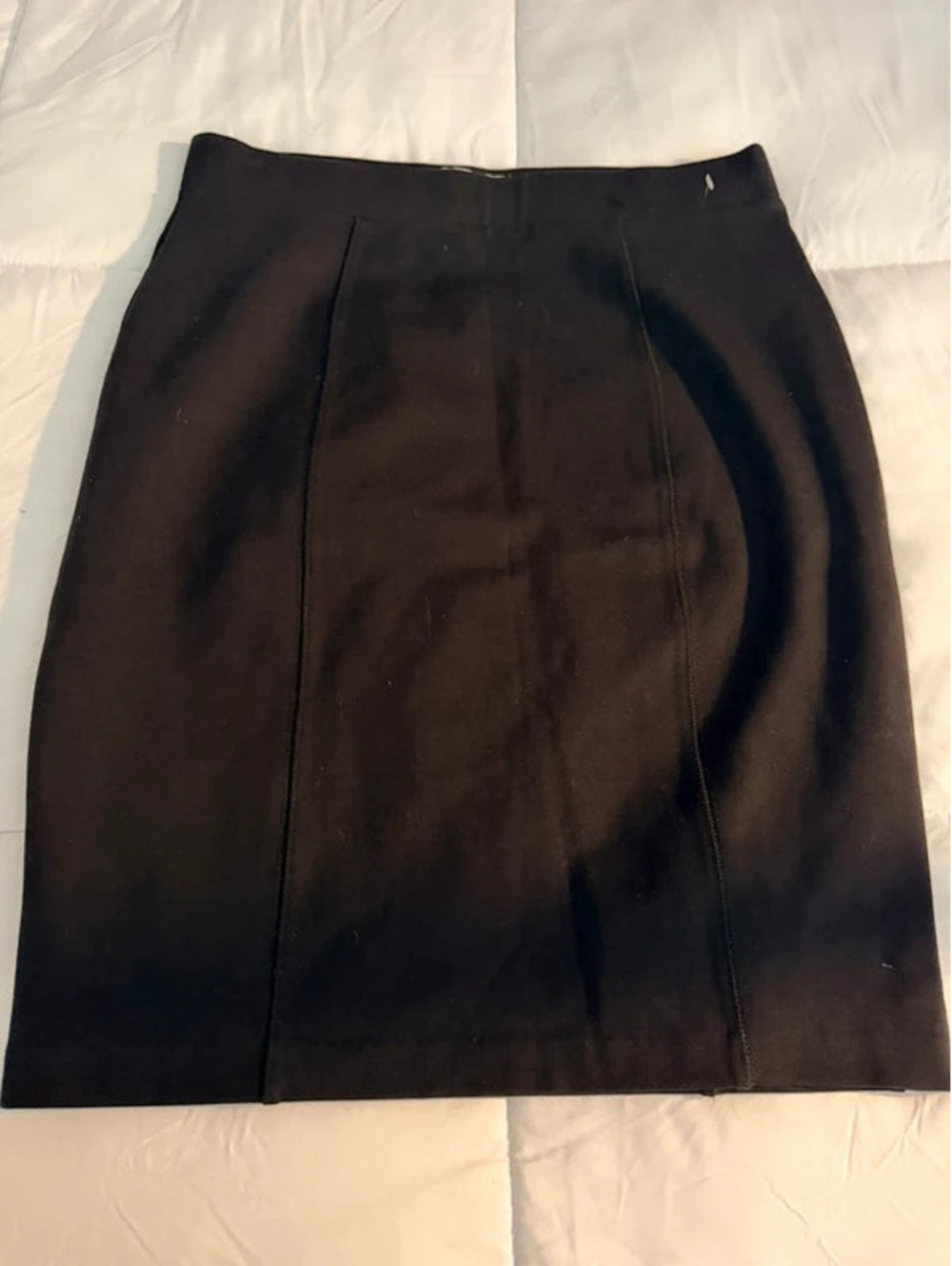 Black Elle pencil skirt with zipper and button closure